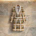 Robe with cat print on a hanger against a marble wall. Garment is a custom pet image design. 